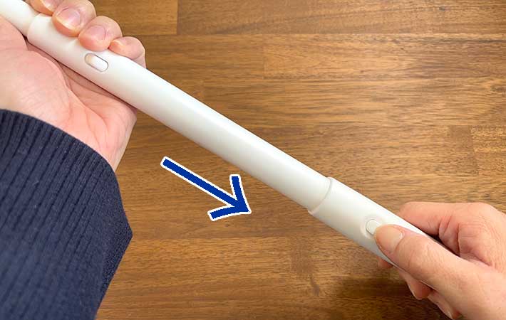 『高密度ブラシ トレループ』ハンディ伸縮タイプの伸縮ボタン